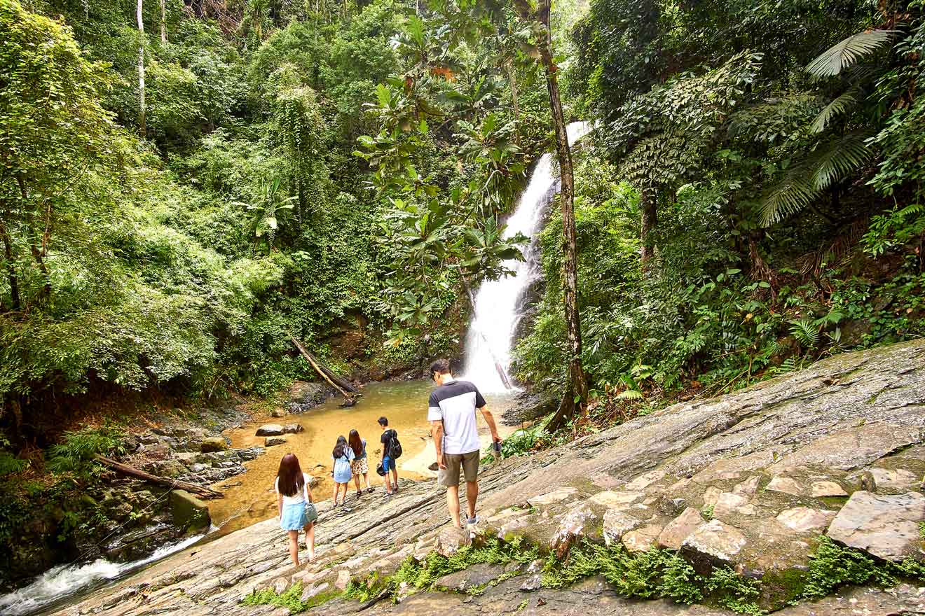tourists at langkawi waterfall