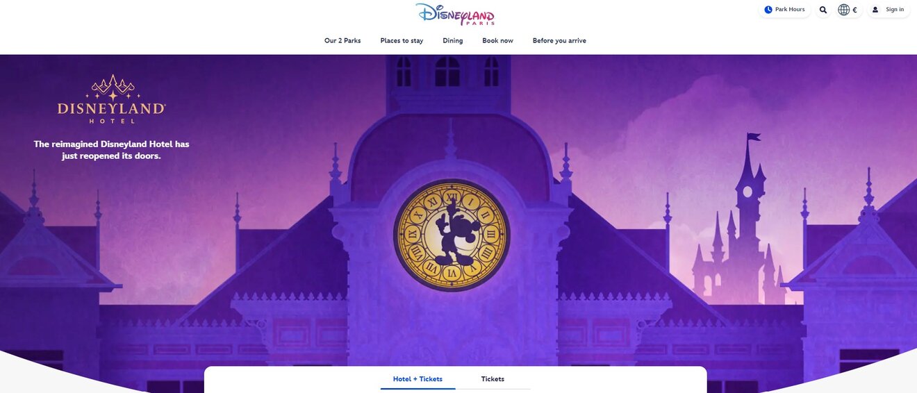 A screenshot of the Disneyland Paris website. The background shows a stylized clock tower against a purple sky.