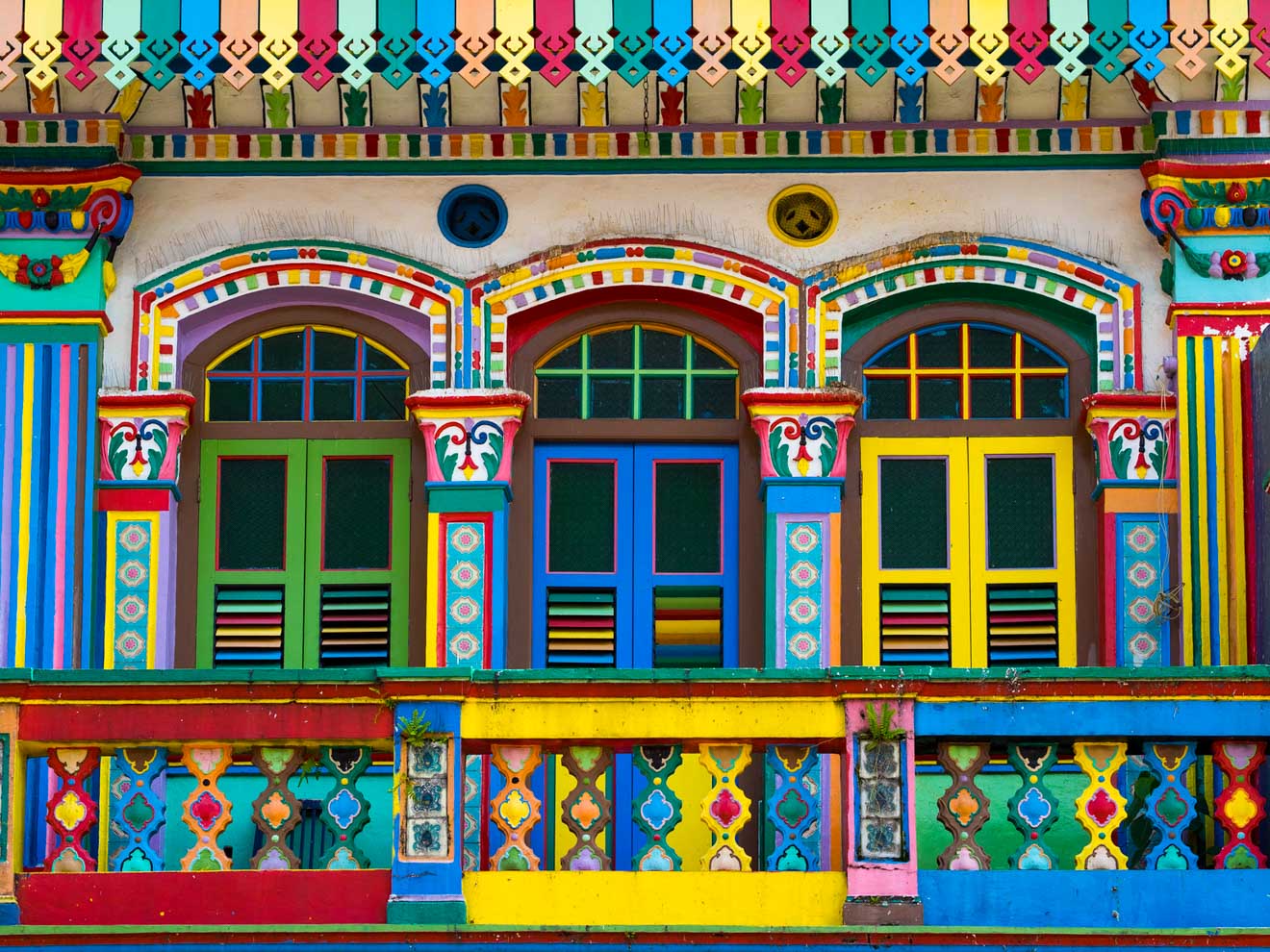 A colorful building with colorful windows in Little India Singapore