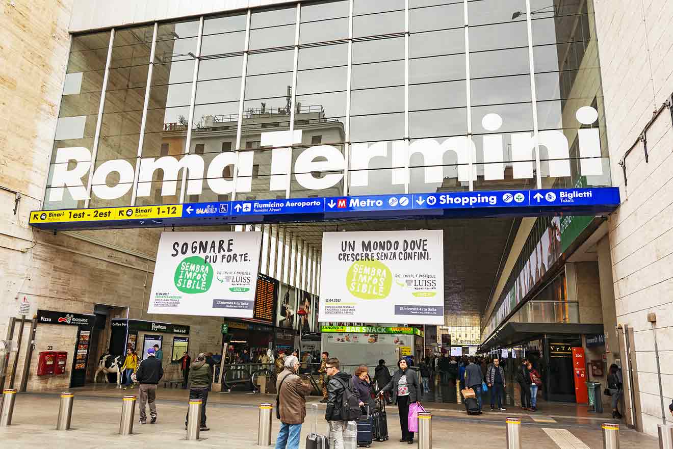 Roma termini is a large building with a sign that reads roma termini.