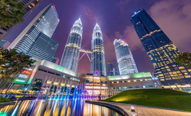 Petrona Twin Towers and Esplanade Lake Symphony in KLCC best place where to stay in kuala lumpur for the first time