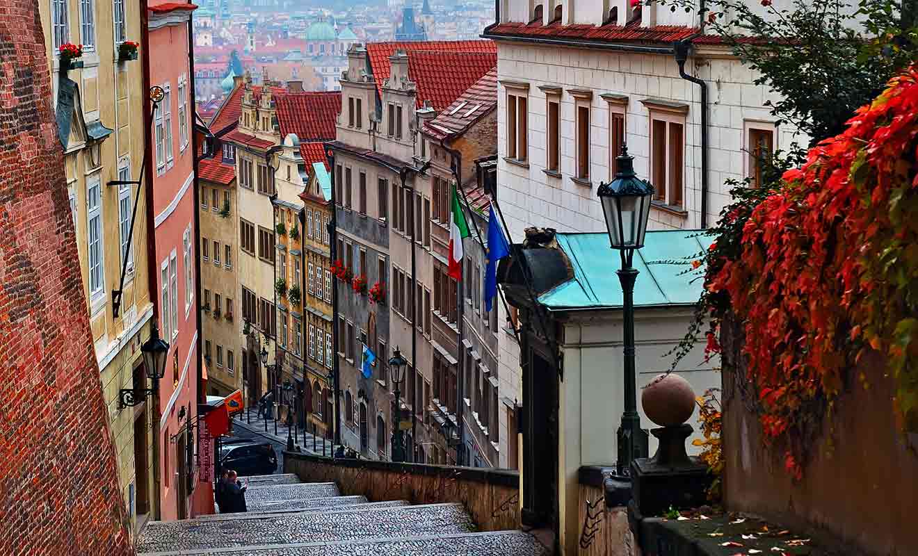 A stairway leading up to a city in czech republic.