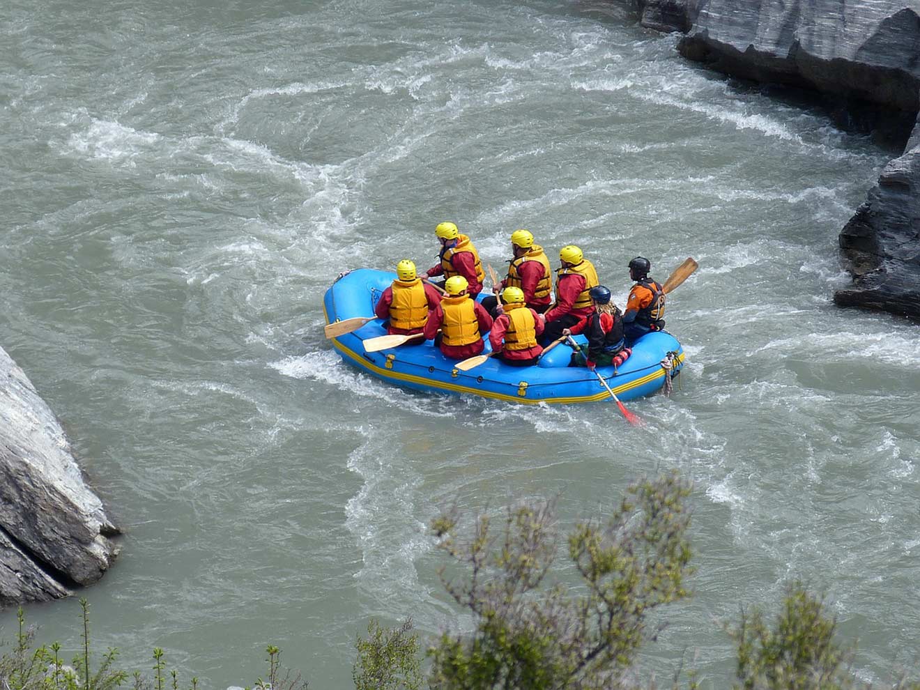 a group of people rafting