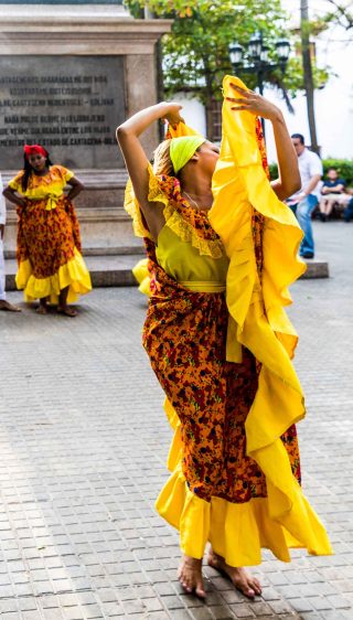woman dancing yellow