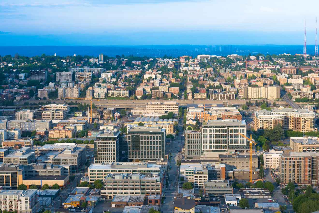 an aerial view of a city with tall buildings