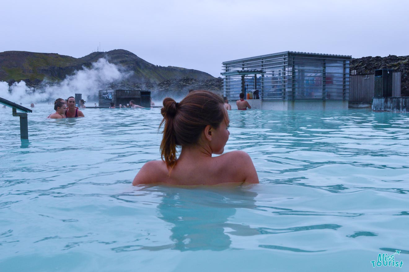 girl relaxing in blue lagoon