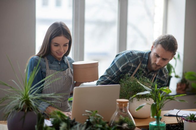 couple with plants