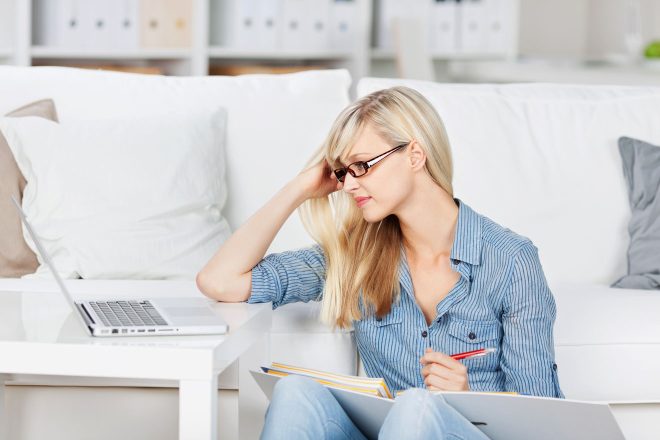 woman looking at laptop