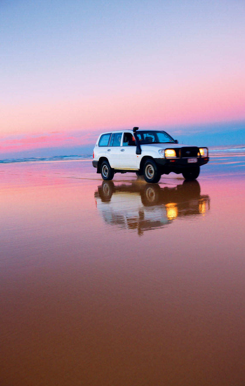 car and lovely sunset things to do in fraser island