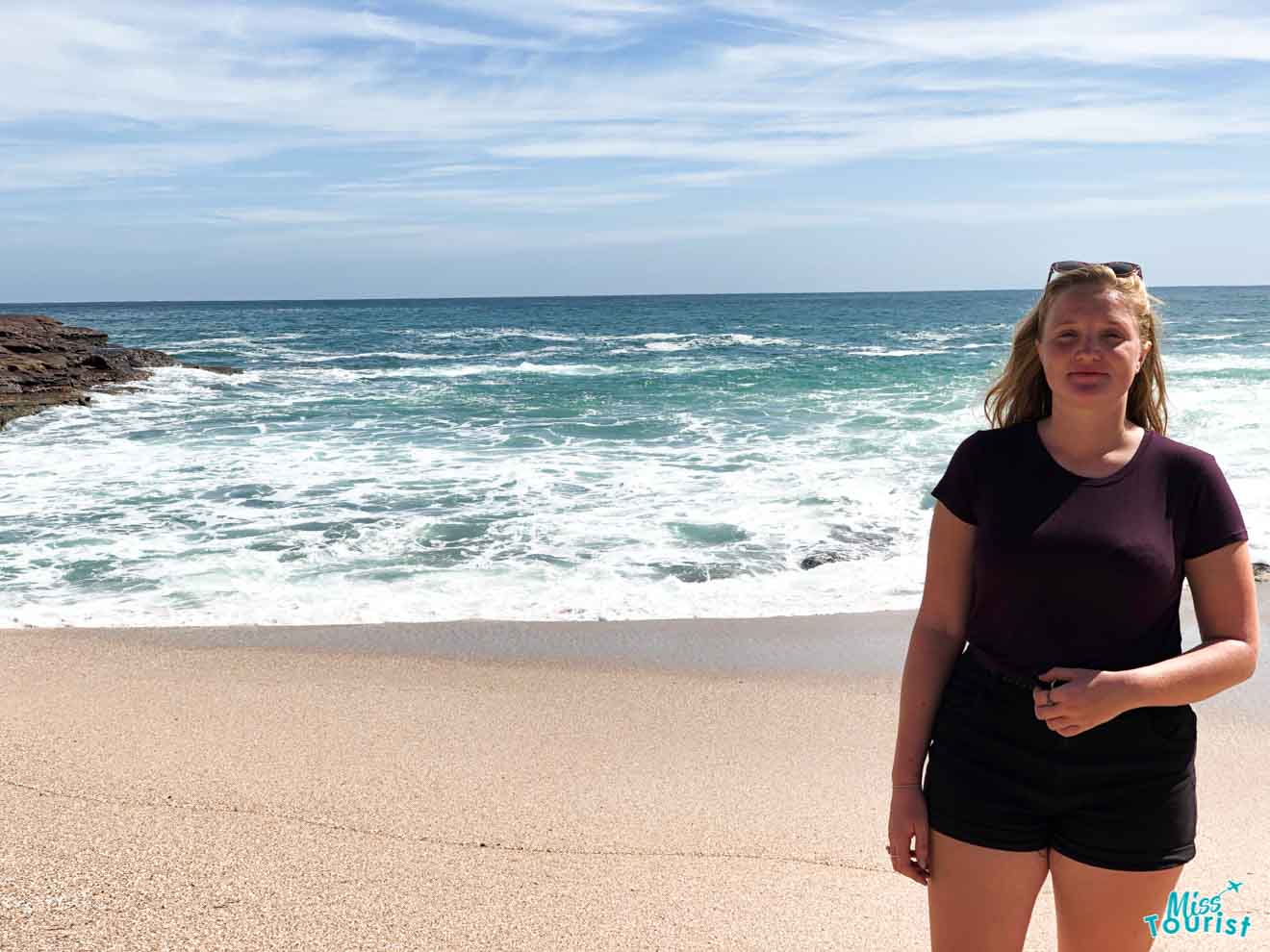 woman on the beach background things to do in sunshine coast