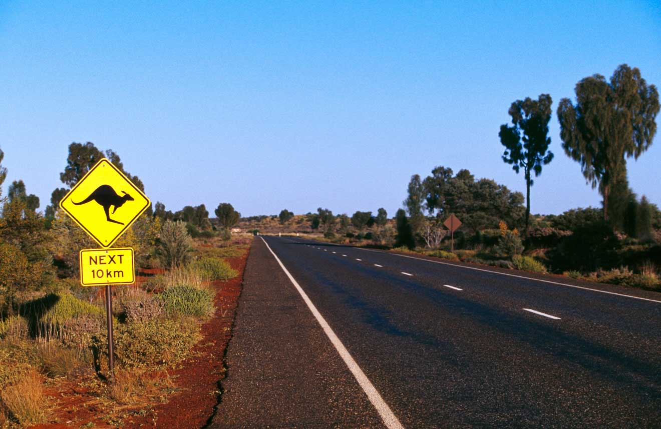 Road Sign Darwin to Alice Springs drive itinerary