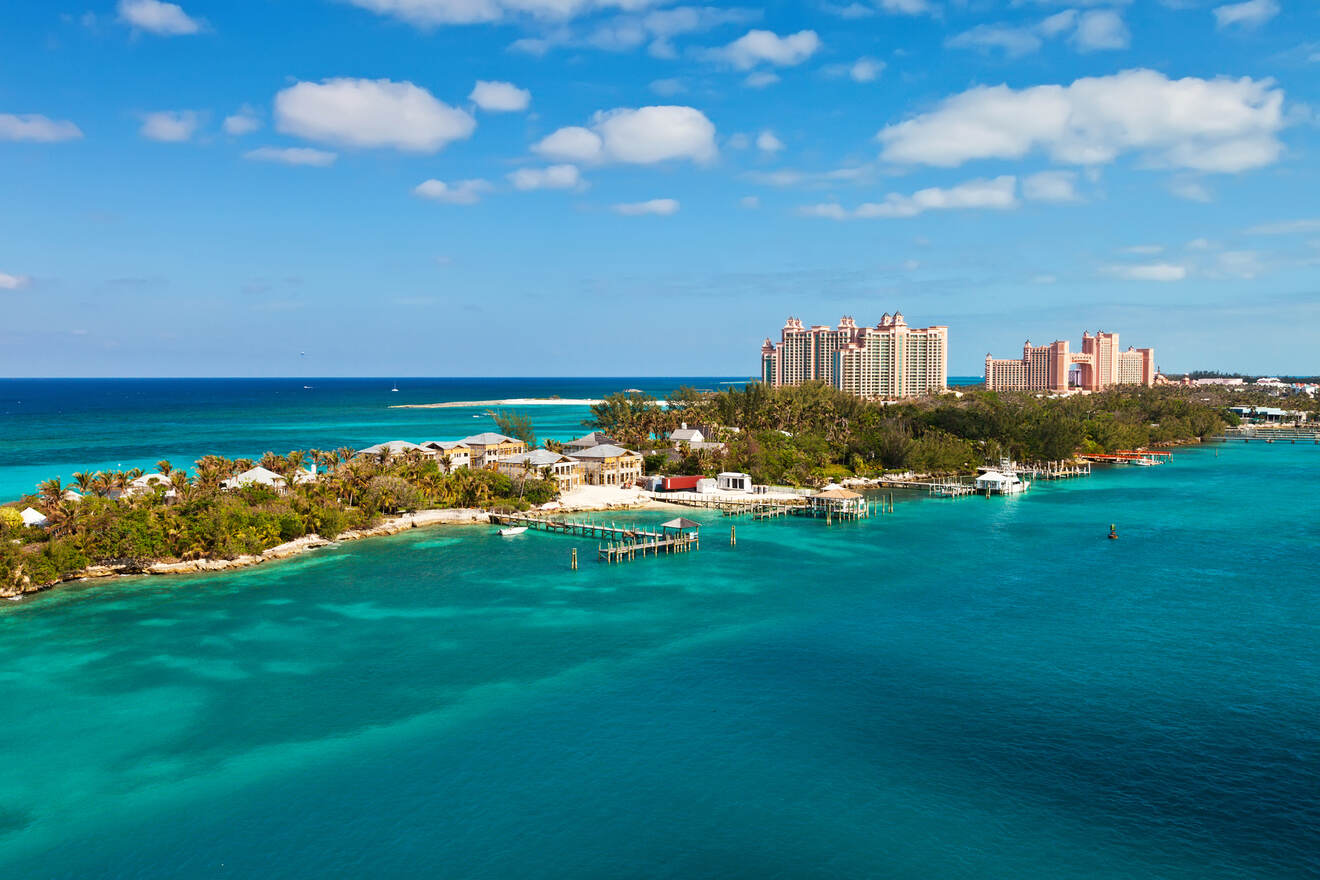 Atlantis Paradise Island resort in the Bahamas with clear turquoise waters and surrounding tropical landscape.