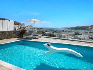 2 2 Whitewashed House in Ornos Beach