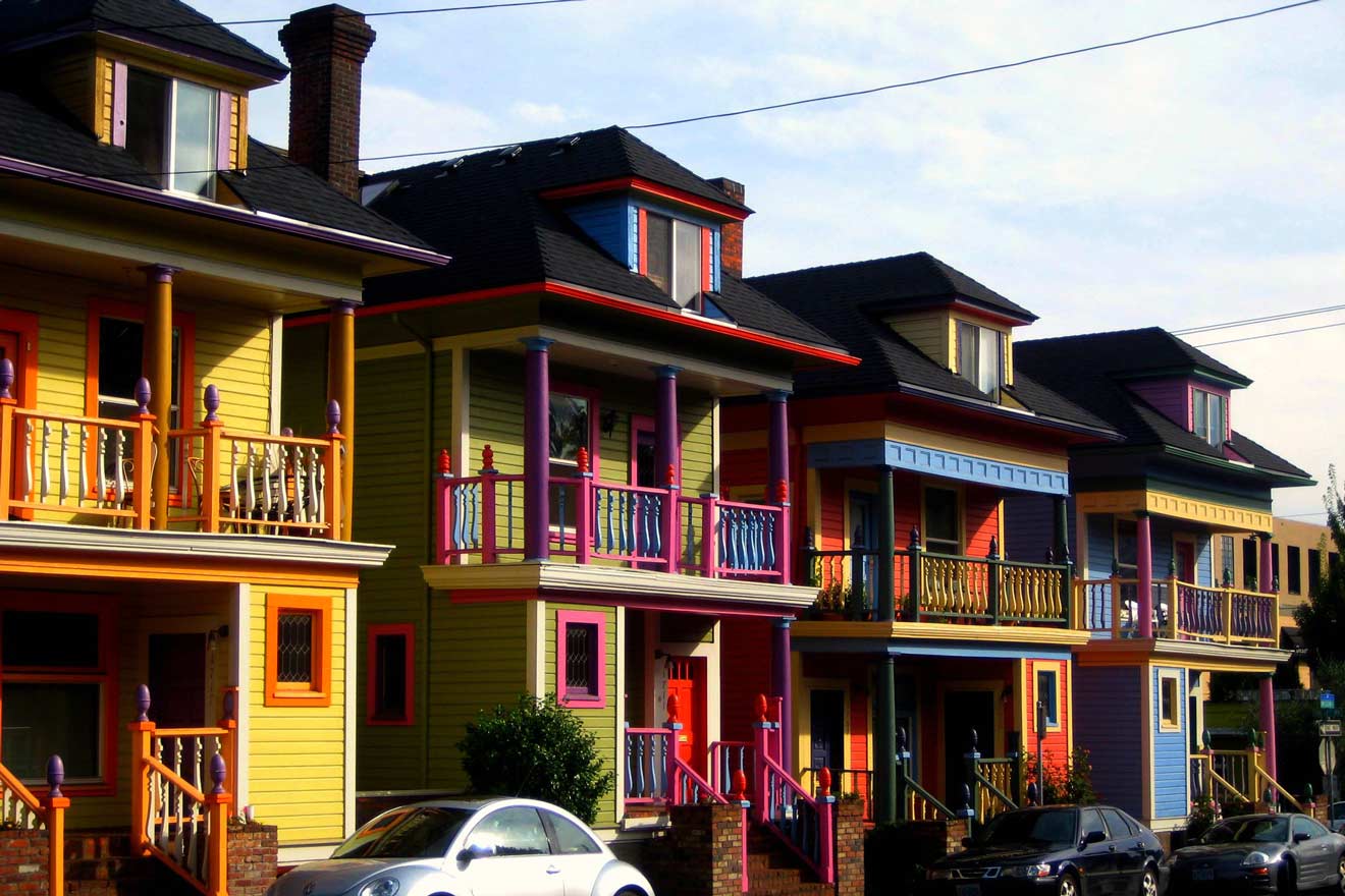 Colorful row houses with vibrant facades and decorative trim in Portland