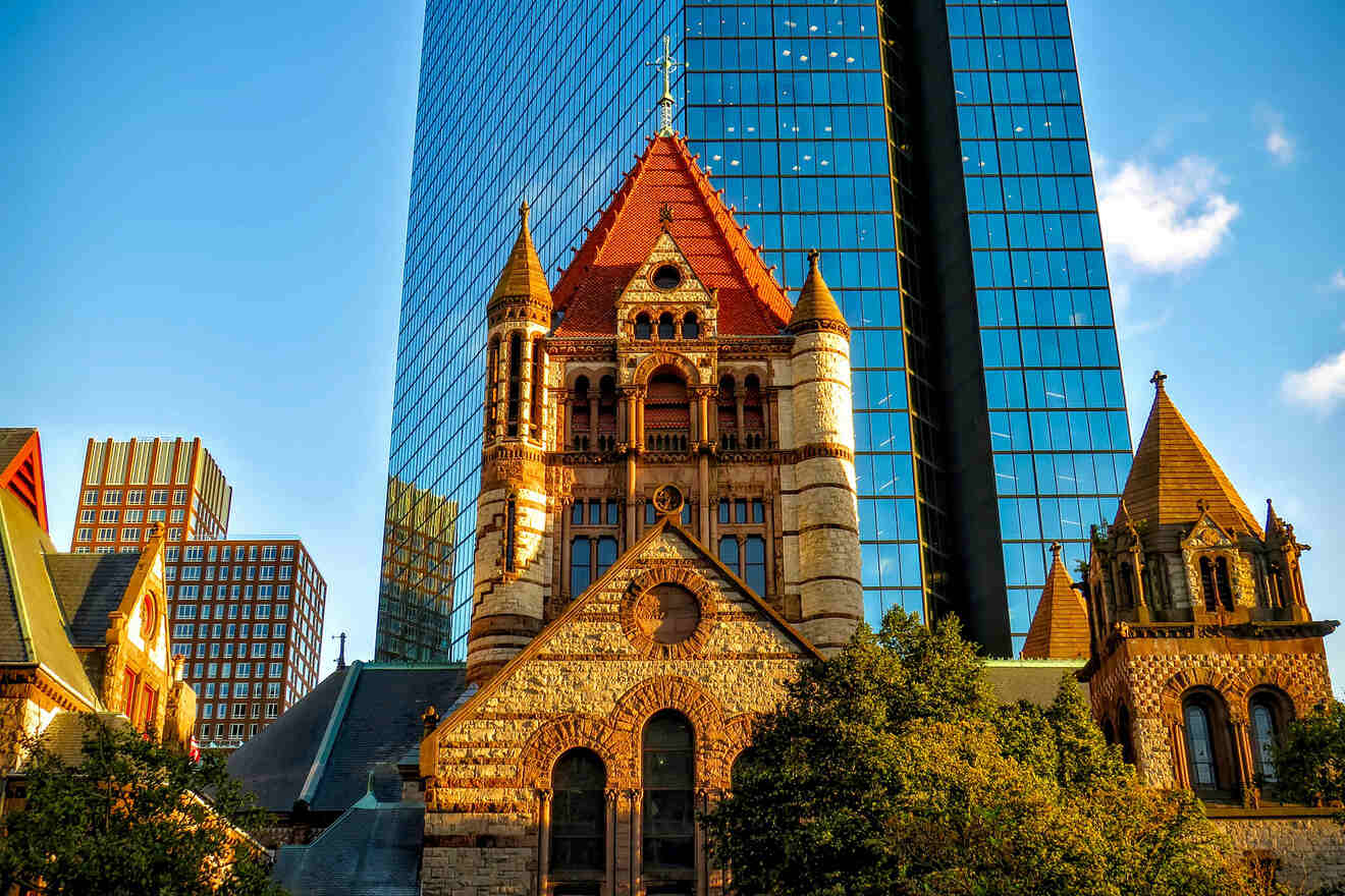 A church in the middle of a city with tall buildings.