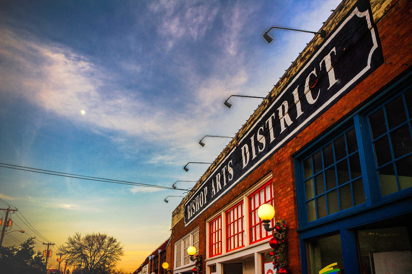 Evening sky over the Bishop Arts District sign in Dallas, highlighting the city's cultural neighborhood and artistic flair.
