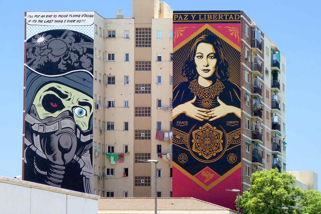 Large mural on a building depicting a contrast of images, with text about ending 'those flying droids' and the words 'PAZ Y LIBERTAD' featuring a woman symbolizing peace and liberty