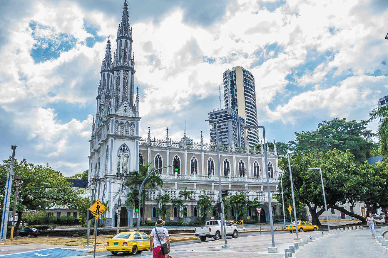 The Iglesia del Carmen, a striking neo-Gothic church in Panama City, with its intricate white spires against a cloudy sky, juxtaposed with modern skyscrapers and bustling street activity