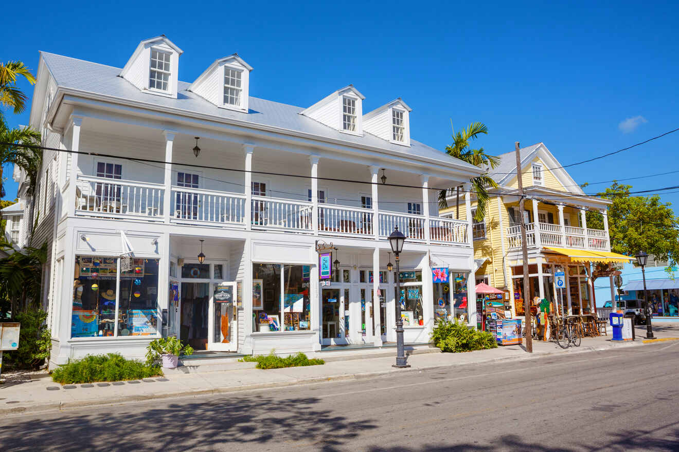 An old white two-story building on Duval Street, the best are where to stay in Key West