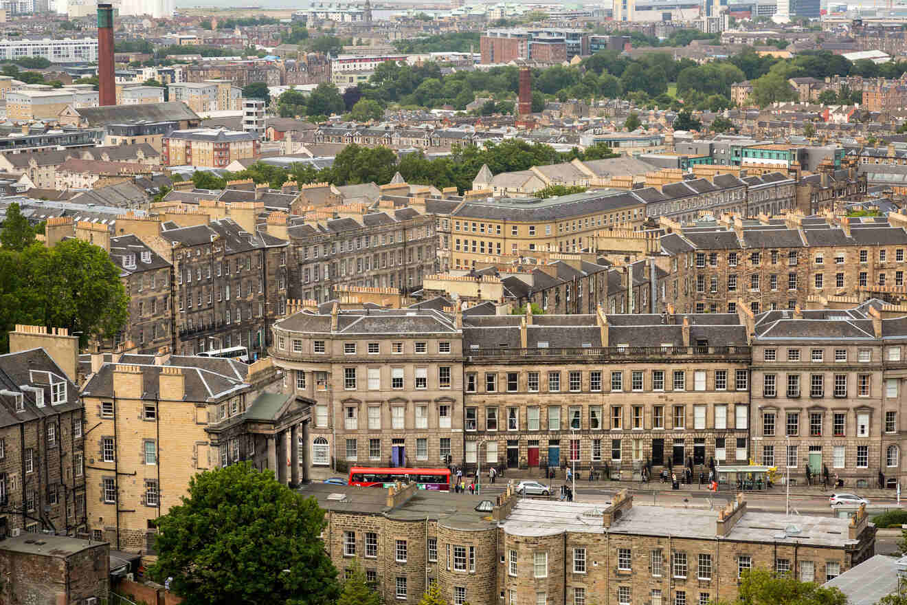 An expansive aerial view of Edinburgh’s dense architecture with rows of traditional tenement buildings, a contrast of historical and modern urban living