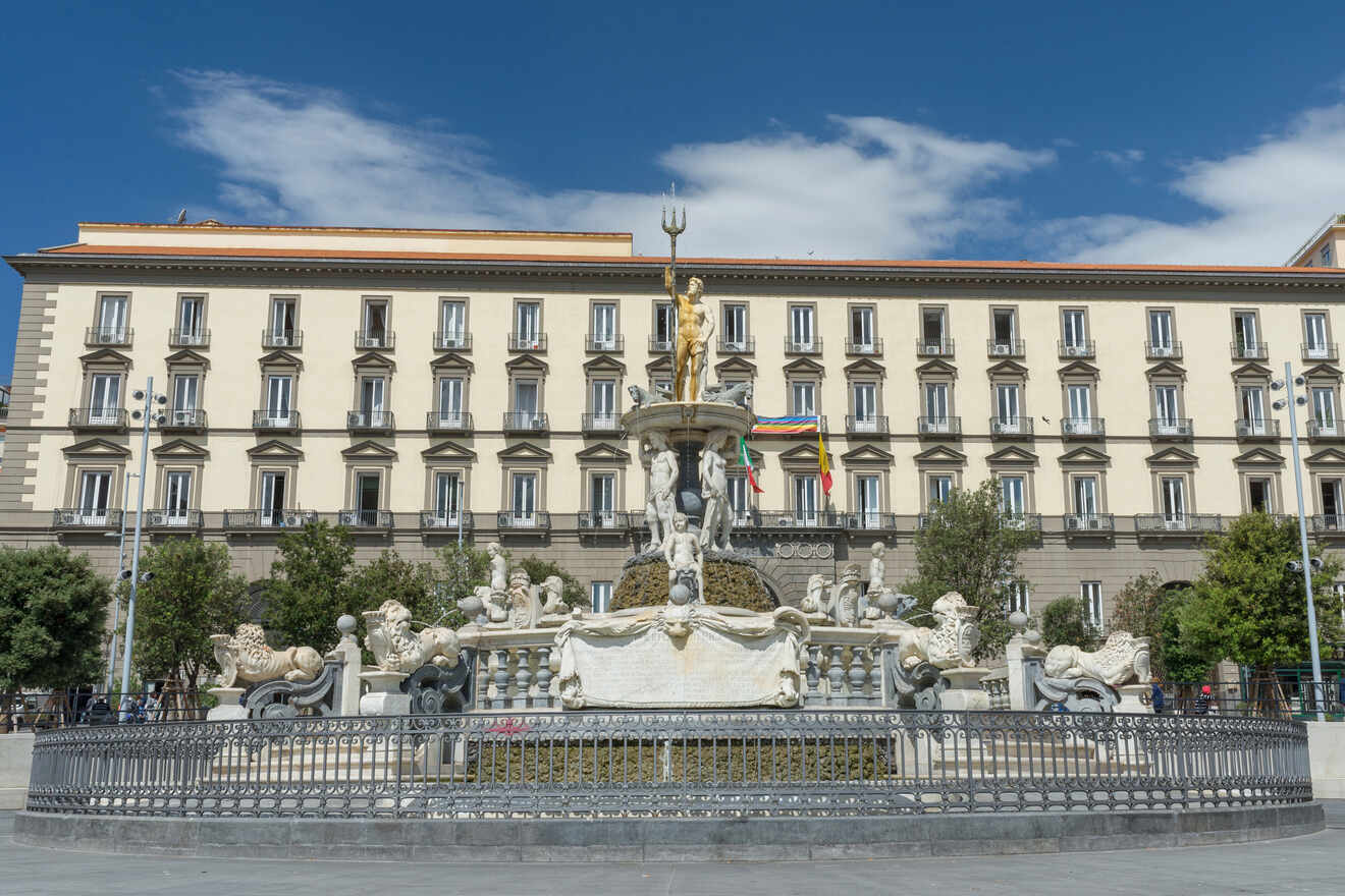 A fountain in front of a large building in Quartieri Spagnoli, Naples.