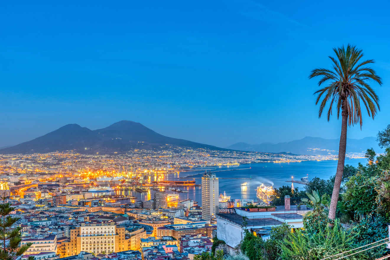 A view of the city of naples at dusk.