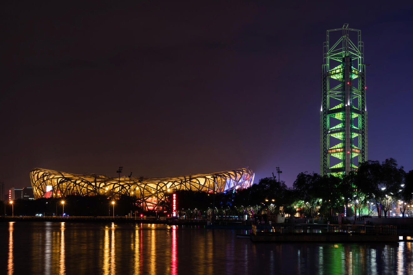 The Bird's Nest Stadium and the Olympic Tower in Beijing illuminated at night