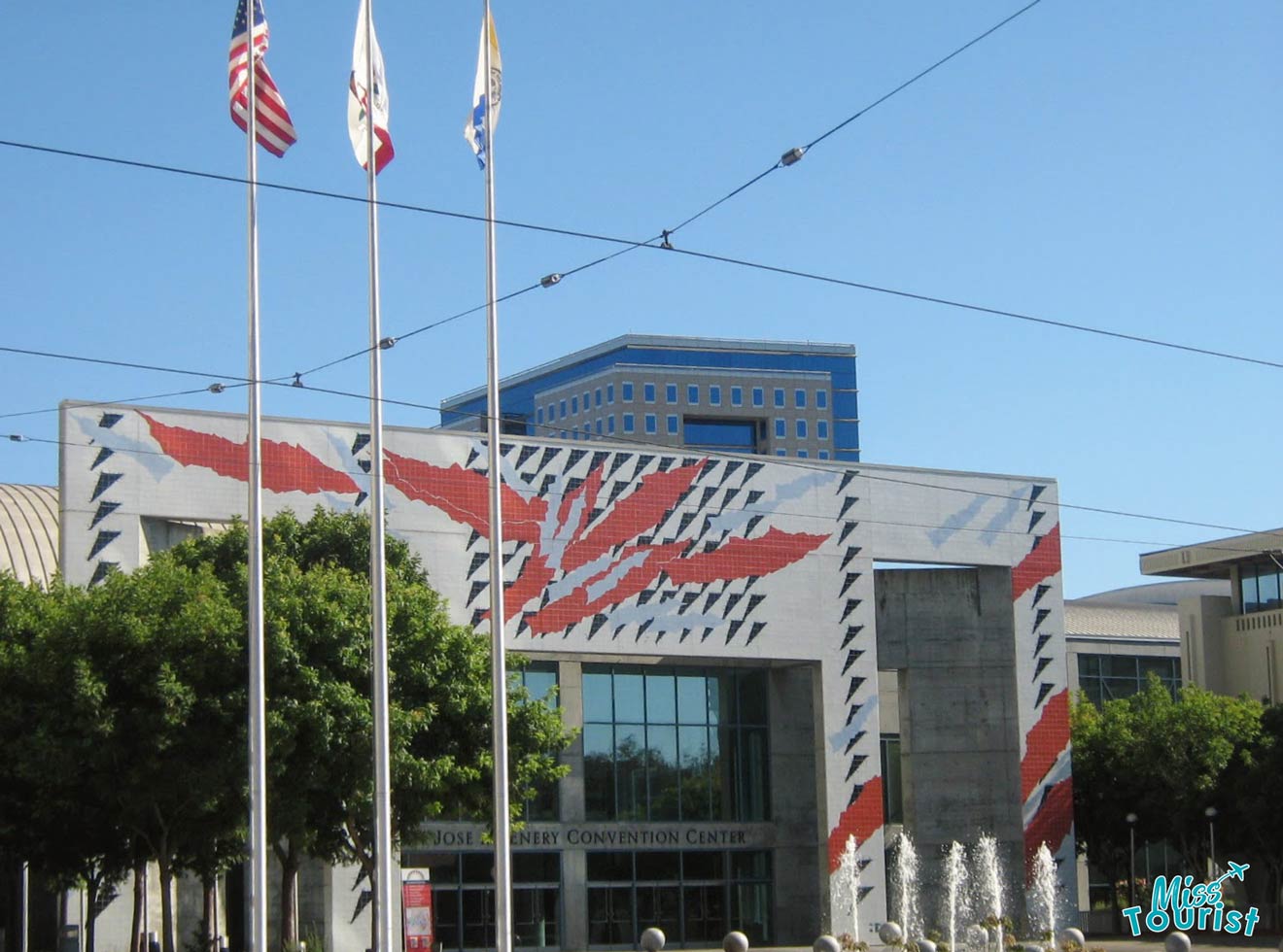 a building with flags in front of it