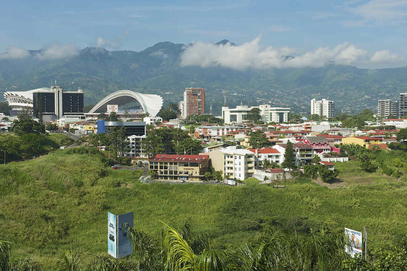 A scenic view of San José, Costa Rica, with mountains and modern buildings