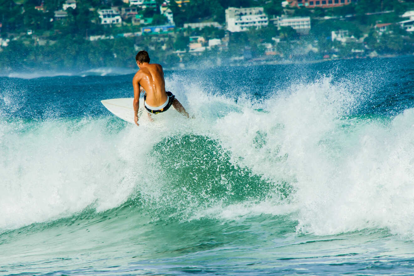 a man surfing on a wave