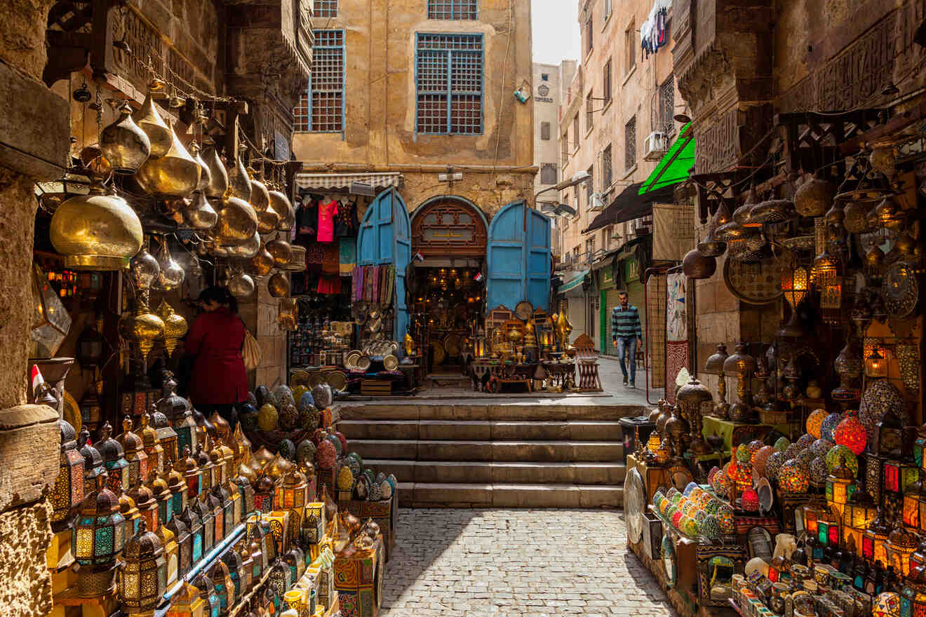 Bustling marketplace with shops selling lanterns and traditional goods.