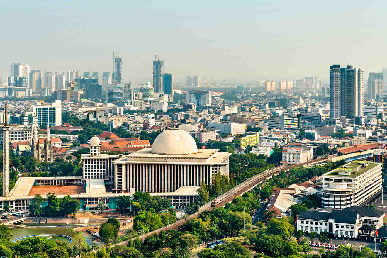 Aerial view of the Istiqlal Mosque and the surrounding cityscape of Jakarta, Indonesia