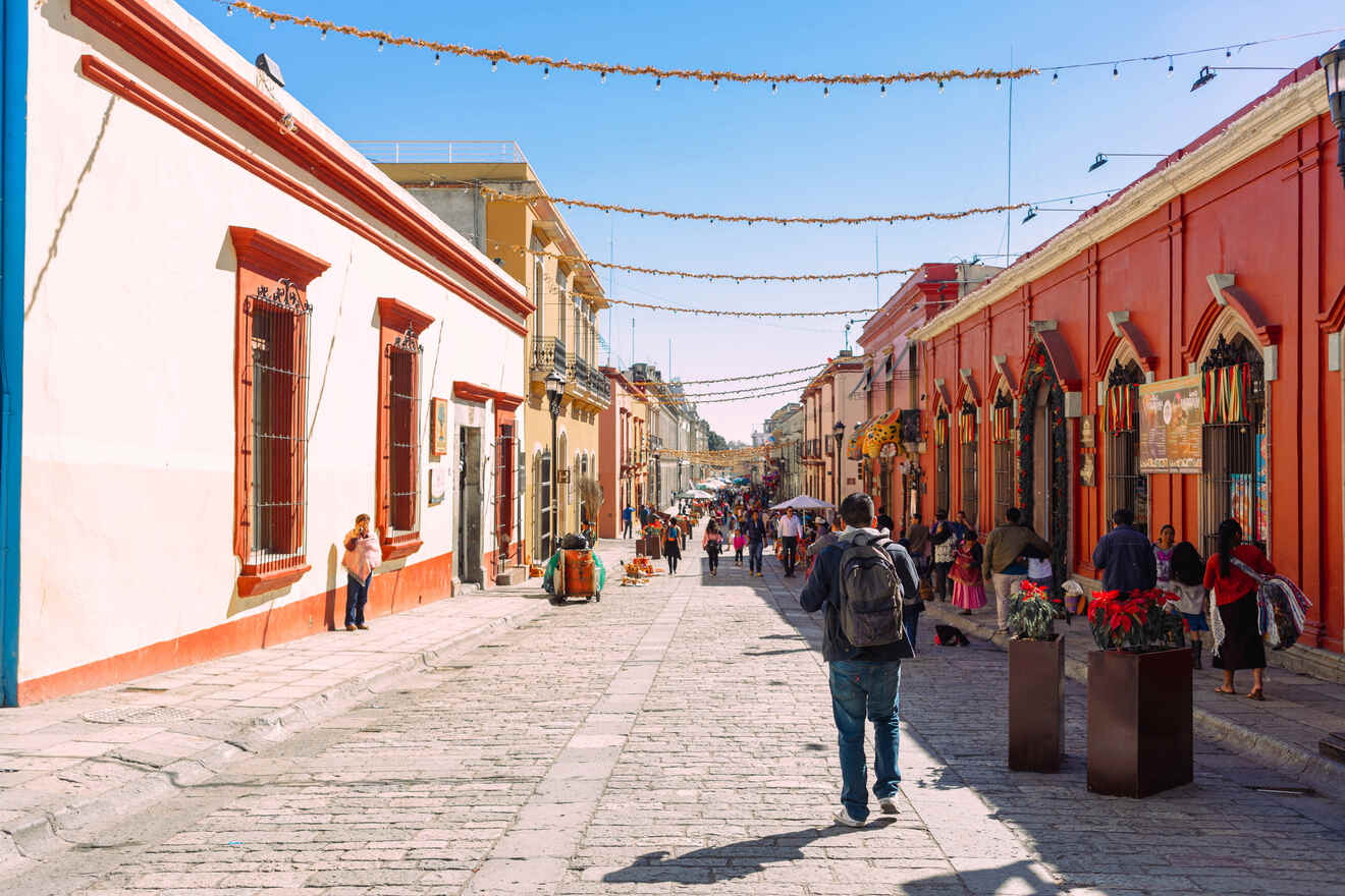 A person walking on a street in Oaxaca