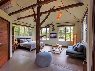Cozy and unique interior of a cabin with tree branch structures