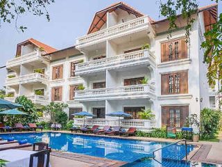 A colonial-style Siem Reap hotel with a poolside view