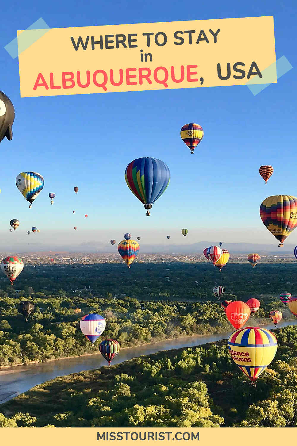 Hot air balloons of various colors and patterns float over a green landscape and river, with text at the top reading "WHERE TO STAY in ALBUQUERQUE, USA." The bottom of the image shows "MISSTOURIST.COM.