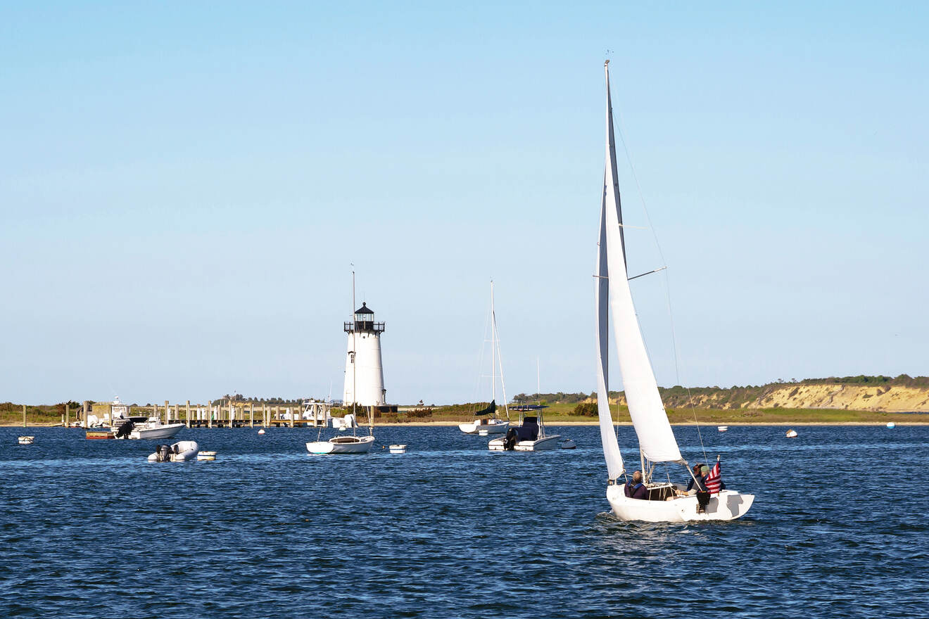 Sailing in harbor by Edgartown lighthouse on Marthas Vineyard island Boston