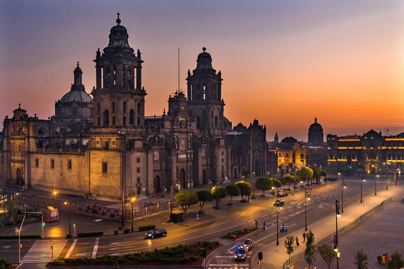 the historic Mexico City Metropolitan Cathedral at sunset, with a softly lit sky and streetlights