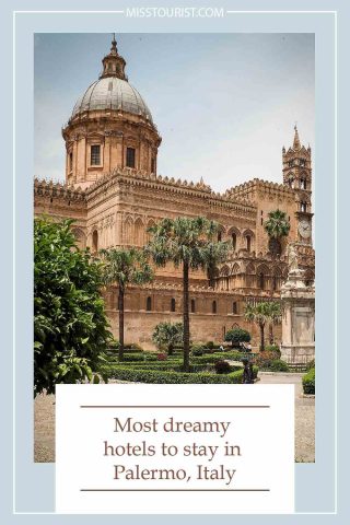 Historic stone building with a large dome and intricate architecture surrounded by palm trees in Palermo, Italy. Text: "Most dreamy hotels to stay in Palermo, Italy.