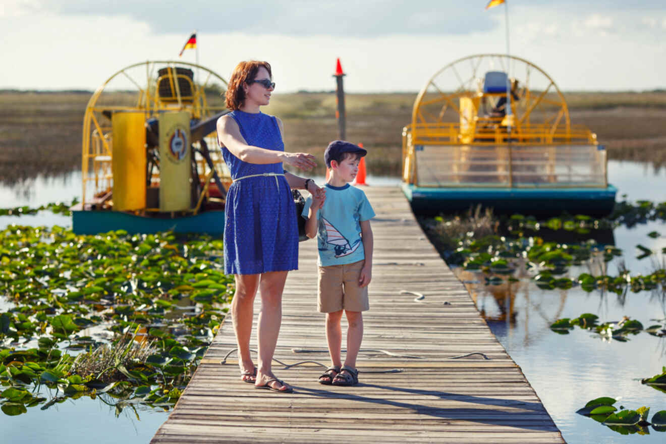 mom and son on a wooden pier in Florida Everglades