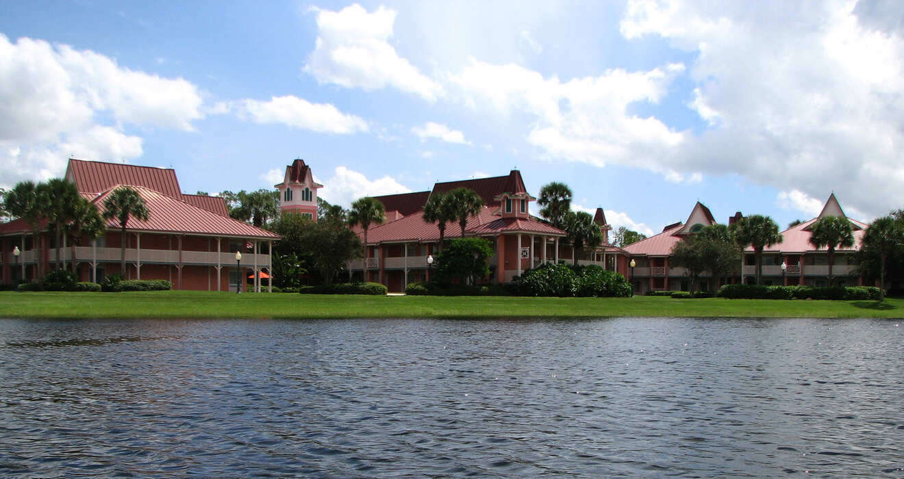 various buildings next to a lake