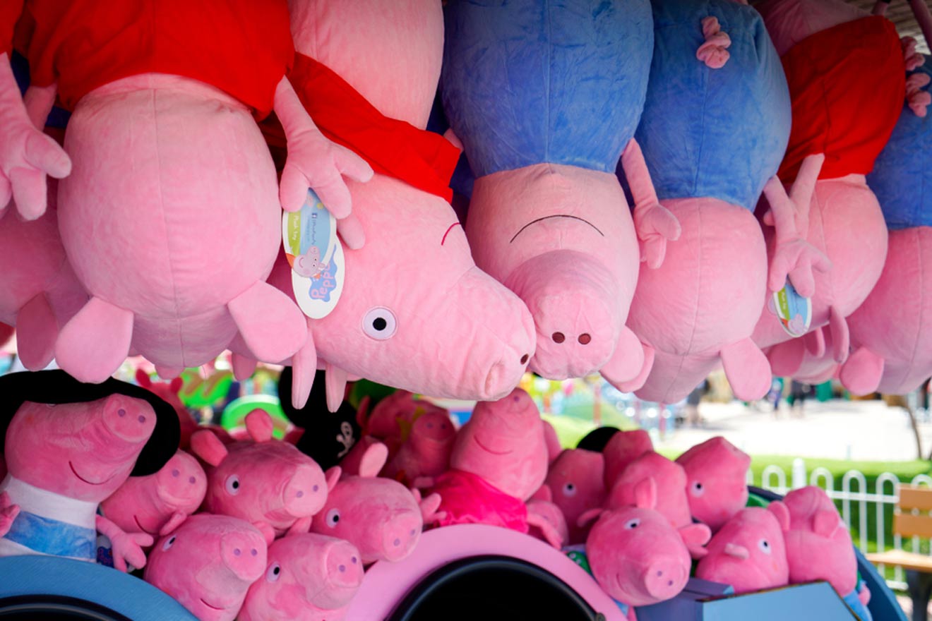 lots of plush Peppa Pigs and her family