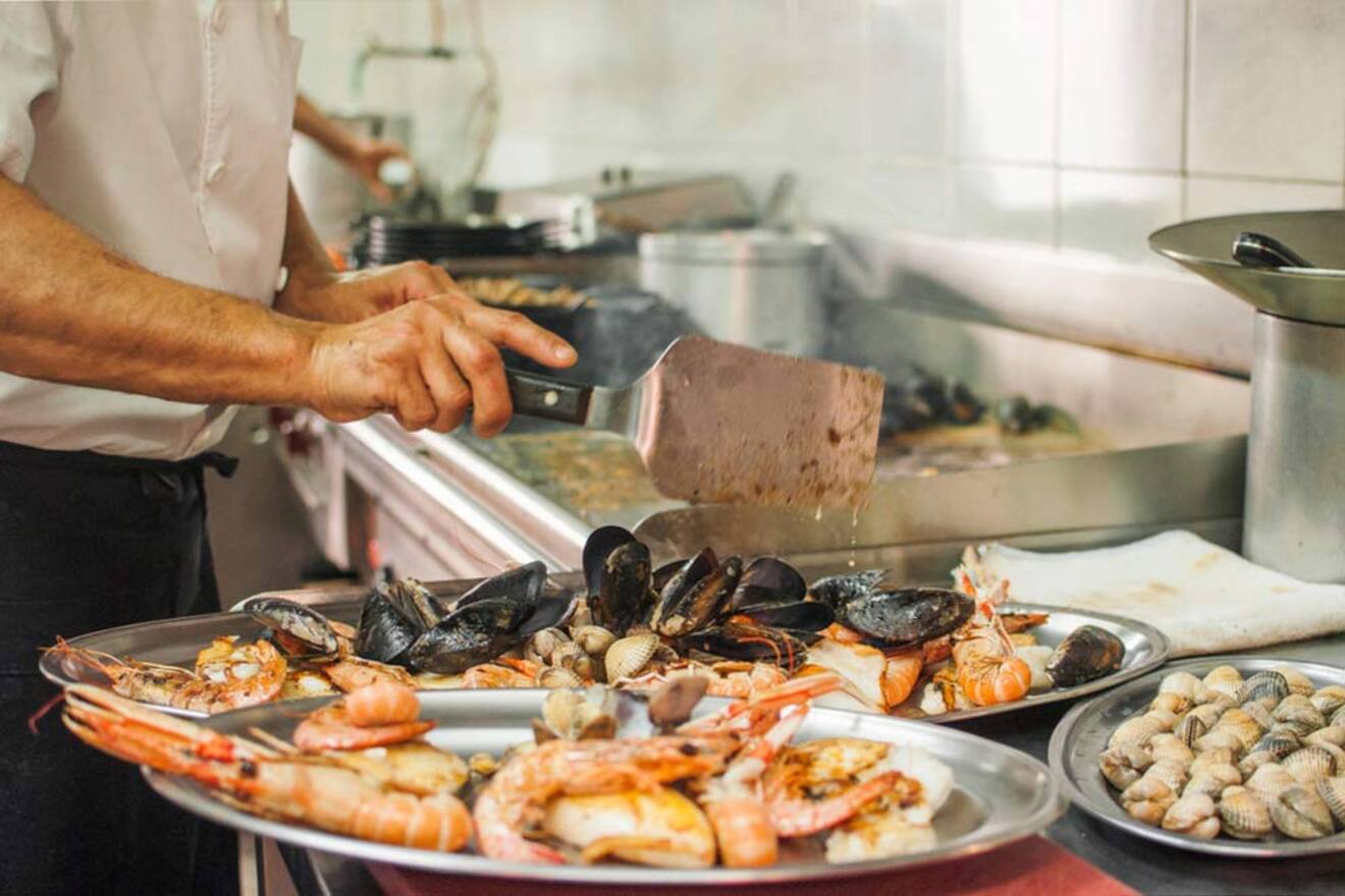 chef cooking seafood in a restaurant 