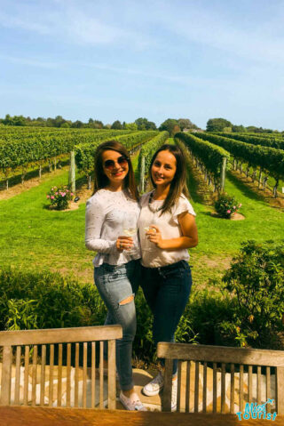 girls holding a glass of wine 