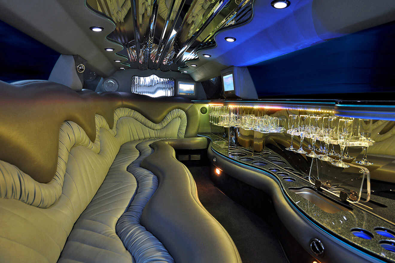 interior of a limousine and glasses of wine