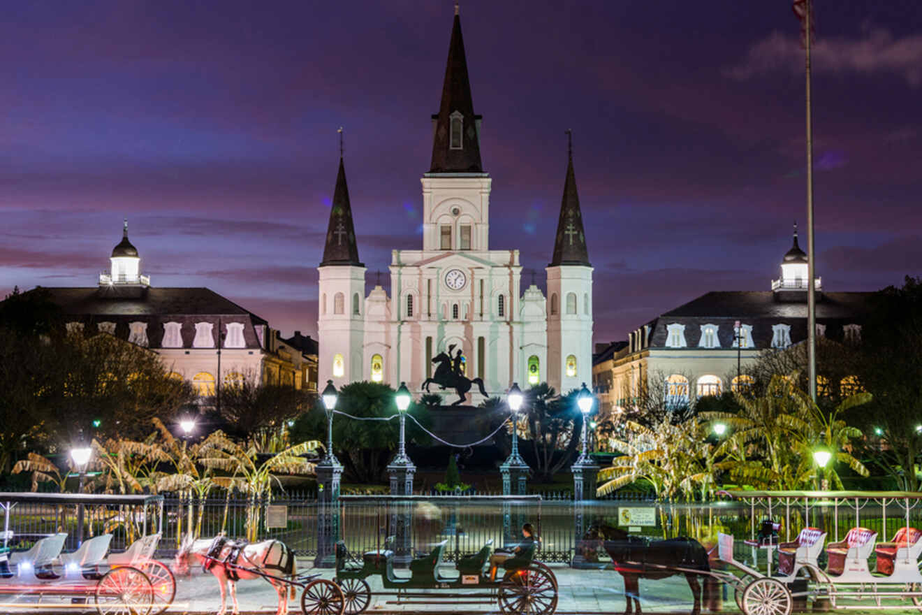 St. Louis Cathedral at night with a couple of carriages waiting for tourists