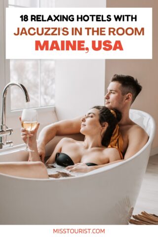 couple enjoying a glass of wine in the hot tub