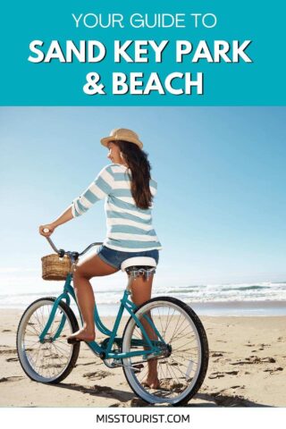 a woman on a bike on the beach