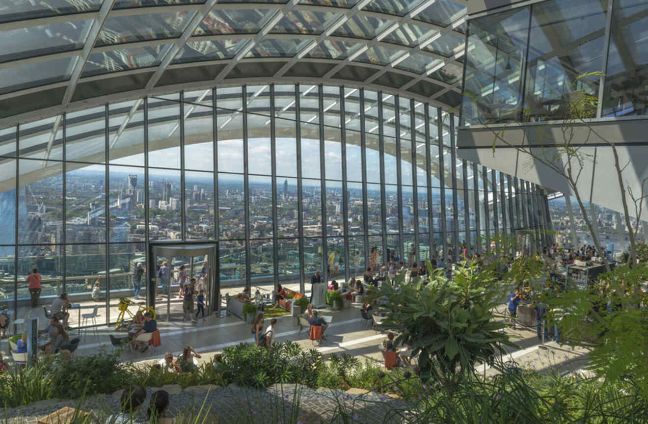 Sky Garden's interior with many plants with a panoramic view of London