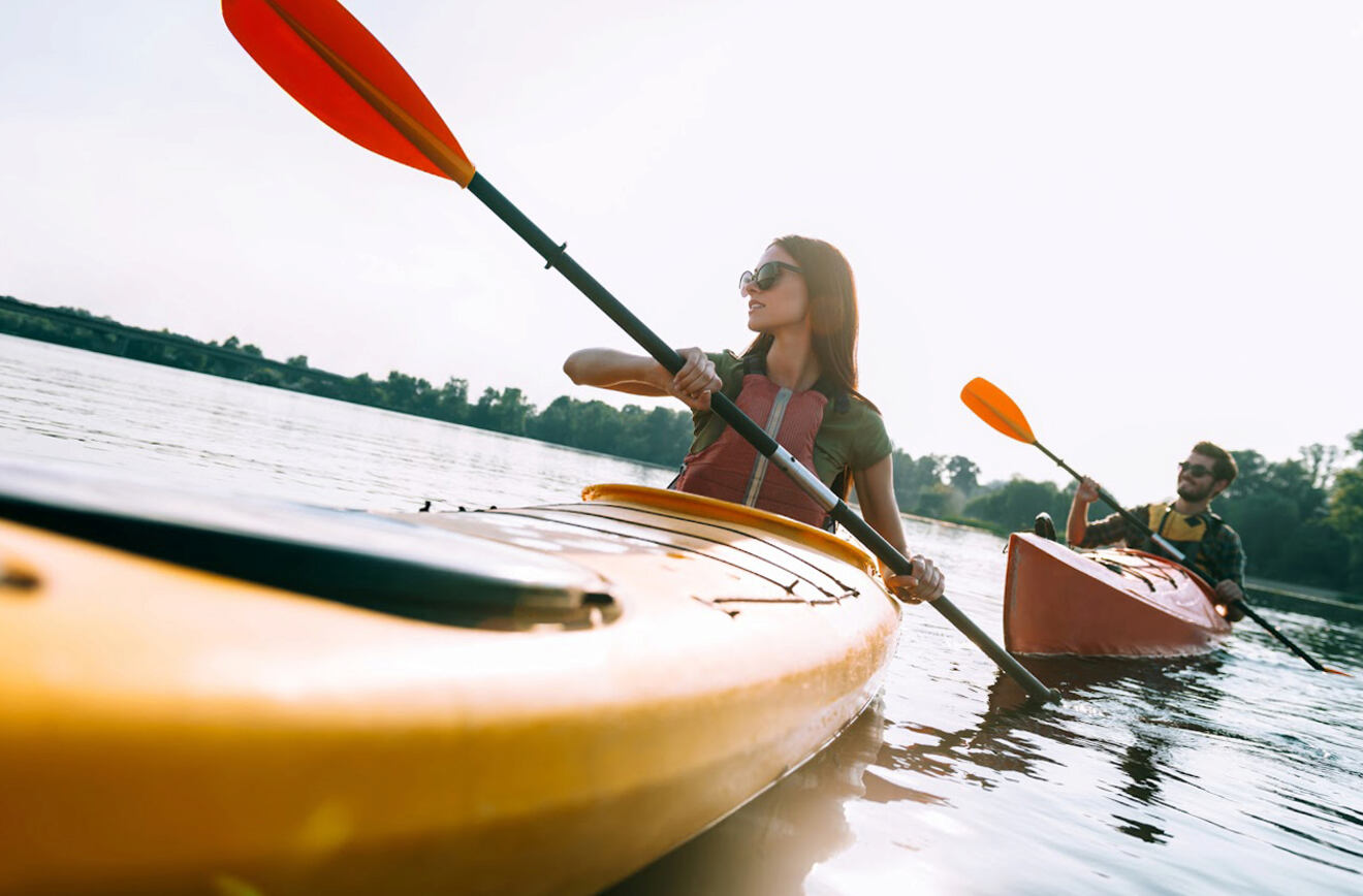 man and woman kayaking